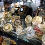 The belt buckle display inside Redmond Work and Western Wear in Redmond on March 4. Mitchell Atencio/staff photo