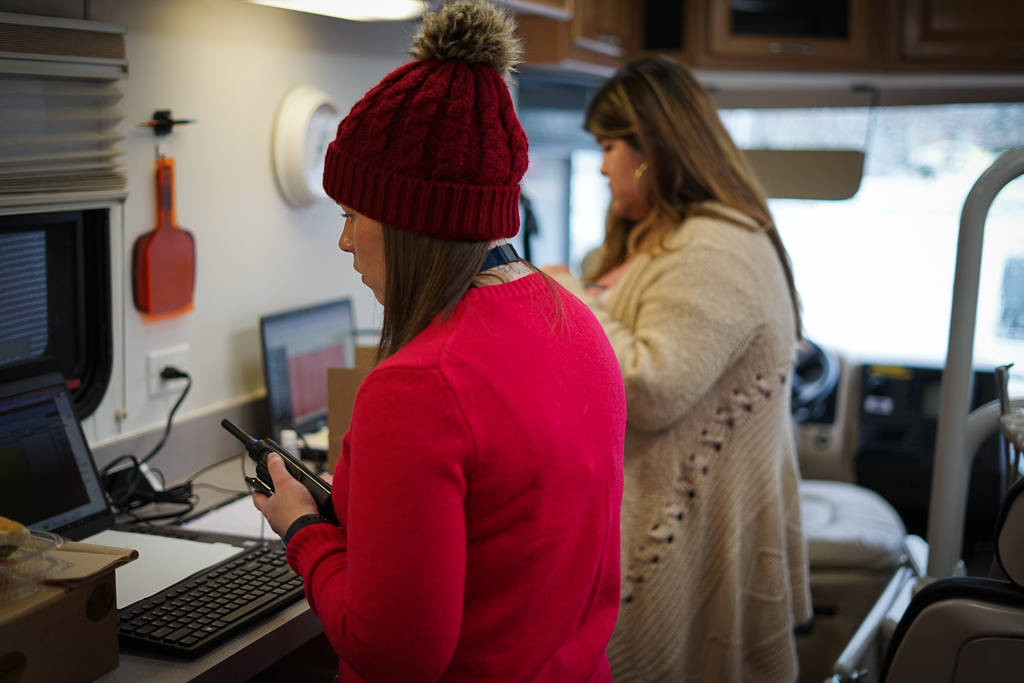 Members of Swedish Issaquah Campuss staff register patients at the drive-by COVID-19 testing site. The testing site is being supported by a Medical Teams International, which converted one of its mobile dental clinics into a command center for the site. Photo courtesy of Medical Teams International