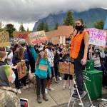 Salma Habashi, pictured here on the ladder, is a Senior at Mt. Si High School. She organized the June 6 march in support of other Black Lives Matter protests happening across the country in an effort to educate people. Photo contributed by Noha Habashi.