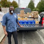 Classic Eats Restaurant owner Tony Hayes distributing food to Highline School District staff. Courtesy photo/Tony Hayes.