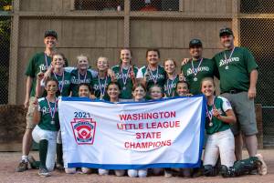 Redmond Little Leagues state-championship softball majors squad. Top row (left to right): Coach Wes Barcalow, Julia Cady, Ella Carter, Livy Ruess, Ainsley Barcalow, Mia Perez, Addy Ruess, manager Casey Ruess and coach Robert Hartman. Bottom row (left to right): Daisy Walker, Simone Loving-Williams, Ella Enich, Abby Hartman, Zoey Cooper, Maggie Enich and Kati Cygan. Photo courtesy of Swen Richter