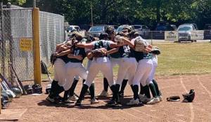 The Redmond softball team gets fired up during its game against Alaska. Courtesy photo