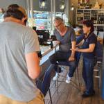 While filming the Issaquah Restaurant Spotlight series, Troy Kline tastes his favorite Thai dish at Sip Thai Zooom alongside restaurant owner Joon Likit.