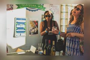 Each participating business hosts a winery and an artist, creating a walking tour of art and wine. Photo courtesy of Downtown Issaquah Association.