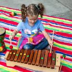 Everywhere you go, its part of the vibe – kids as young as six and people in their 80s, all performing or enjoying the moment together. Photo courtesy of Downtown Issaquah Association.