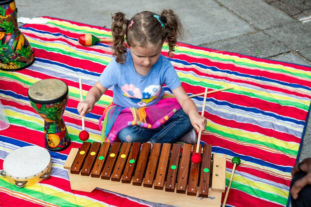 Everywhere you go, its part of the vibe – kids as young as six and people in their 80s, all performing or enjoying the moment together. Photo courtesy of Downtown Issaquah Association.