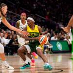 Erica Wheeler drives to the basket against the Minnesota Lynx. Photo courtesy of Seattle Storm.